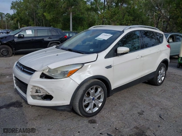 2015 Ford Escape Titanium with VIN 1FMCU0JX1FUC31418, listed as a IAAI auction lot 41900497 with 91,304 mi miles. Bid and sale history available at carsss.com. Image 2.