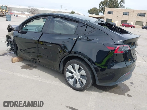 2023 Tesla Model Y Long Range with VIN 7SAYGDEE1PF748426, listed as a IAAI auction lot 41839308 with 26,633 mi miles and . Bid and sale history available at carsss.com. Image 3.