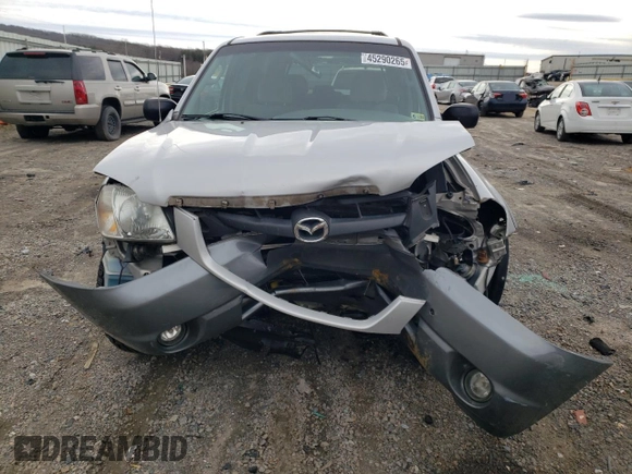 2002 Mazda Tribute LX with VIN 4F2CU08122KM01491, listed as a Copart auction lot 45290265 with 134,141 mi miles and Salvage Title. Bid and sale history available at carsss.com. Image 5.