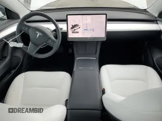 2021 Tesla Model 3 Standard Range Plus with VIN 5YJ3E1EA6MF066064, listed as a Copart auction lot 54063625 with 27,424 mi miles and Salvage Title. Bid and sale history available at DreamBid. Image 8.