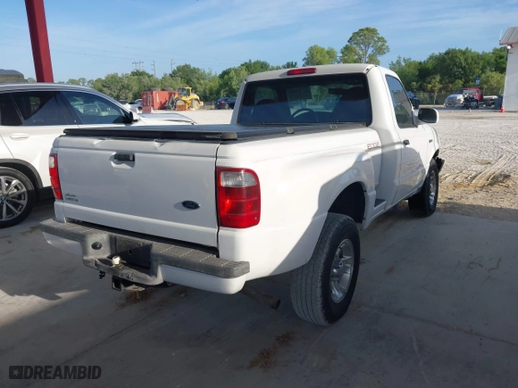 2003 Ford Ranger XL with VIN 1FTYR10U53PB75860, listed as a IAAI auction lot 41953686 with 129,082 mi miles. Bid and sale history available at carsss.com. Image 4.
