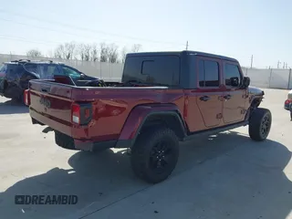 2021 Jeep Gladiator Willys z VIN 1C6HJTAG0ML536455, wystawiony jako IAAI lot #41702393 z przebiegiem 90 644 mil mil oraz . Historia ofert i sprzedaży dostępna na DreamBid. Obrazek 4.