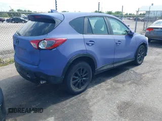 2013 Mazda CX-5 Sport with VIN JM3KE2BE8D0160381, listed as a IAAI auction lot 42438461 with 213,354 mi miles and . Bid and sale history available at DreamBid. Image 4.