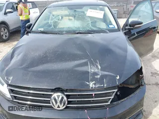 2016 Volkswagen Jetta Sedan 1.4T SE with VIN 3VWD67AJ3GM390273, listed as a IAAI auction lot 41575074 with 114,705 mi miles. Bid and sale history available at carsss.com. Image 6.