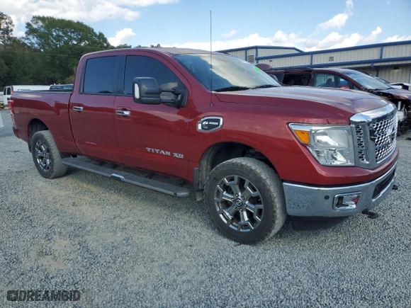 2017 Nissan Titan XD SV with VIN 1N6BA1F44HN574070, listed as a Copart auction lot 74772404 with 182,124 mi miles and Salvage Title. Bid and sale history available at carsss.com. Image 4.