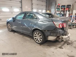 2014 Chevrolet Malibu LTZ with VIN 1G11H5SLXEF271551, listed as a IAAI auction lot 41554245 with 175,305 mi miles. Bid and sale history available at carsss.com. Image 3.