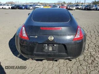 2012 Nissan 370Z Touring with VIN JN1AZ4EH4CM561432, listed as a Copart auction lot 89376935 with 128,955 mi miles and Salvage Title. Bid and sale history available at carsss.com. Image 6.