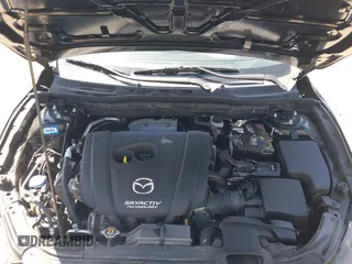 2015 Mazda 3 i Sport z VIN JM1BM1U74F1239306, wystawiony jako IAAI lot #42353133 z przebiegiem 150 051 mil mil oraz . Historia ofert i sprzedaży dostępna na DreamBid. Obrazek 10.
