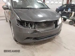 2015 Honda Odyssey EX-L with VIN 5FNRL5H64FB055890, listed as a IAAI auction lot 41706141 with 155,167 mi miles and . Bid and sale history available at carsss.com. Image 6.