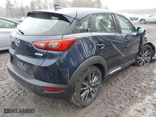 2017 Mazda CX-3 Grand Touring with VIN JM1DKFD75H0179167, listed as a IAAI auction lot 41980243 with 69,076 mi miles. Bid and sale history available at carsss.com. Image 4.