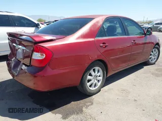 2002 Toyota Camry LE z VIN 4T1BE32K52U082454, wystawiony jako IAAI lot #42276881 z przebiegiem 225 814 mil mil oraz . Historia ofert i sprzedaży dostępna na DreamBid. Obrazek 4.