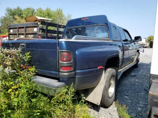 2001 Dodge Ram 3500 with VIN 1B7MC33711J607877, listed as a Copart auction lot 71581024 with 186,115 mi miles and Salvage Title. Bid and sale history available at carsss.com. Image 3.