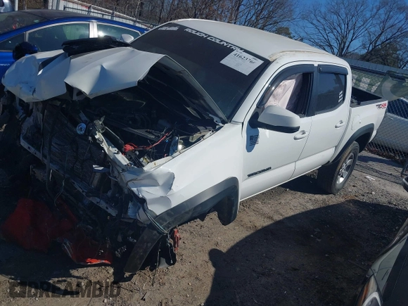 2018 Toyota Tacoma SR with VIN 5TFCZ5AN6JX144056, listed as a IAAI auction lot 41623760 with Not Provided miles and . Bid and sale history available at DreamBid. Image 19.