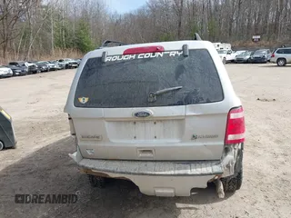 2010 Ford Escape Hybrid z VIN 1FMCU5K33AKC89835, wystawiony jako IAAI lot #41915349 z przebiegiem 125 659 mil mil oraz . Historia ofert i sprzedaży dostępna na DreamBid. Obrazek 16.