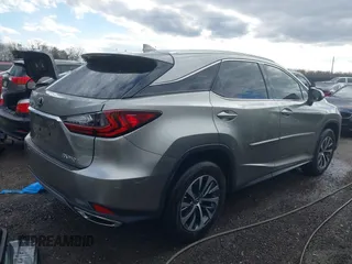 2022 Lexus RX with VIN 2T2HZMDA5NC326016, listed as a IAAI auction lot 40966492 with 22,633 mi miles. Bid and sale history available at carsss.com. Image 4.