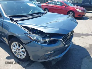 2015 Mazda 3 i Touring with VIN 3MZBM1L79FM187074, listed as a IAAI auction lot 42147375 with 23,394 mi miles and . Bid and sale history available at DreamBid. Image 18.