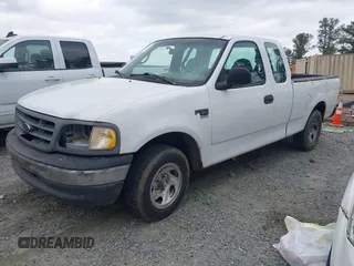 2001 Ford F-150 XL z VIN 1FTRX17W81NB41082, wystawiony jako IAAI lot #41943194 z przebiegiem 207 544 mil mil oraz . Historia ofert i sprzedaży dostępna na DreamBid. Obrazek 2.