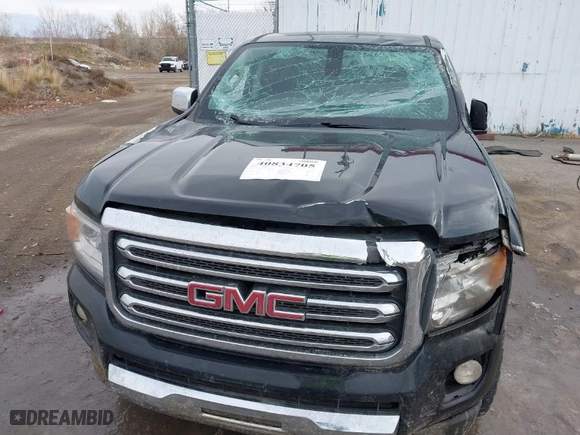 2016 GMC Canyon 4WD SLT with VIN 1GTG6DE3XG1106841, listed as a IAAI auction lot 40834705 with 121,810 mi miles. Bid and sale history available at carsss.com. Image 6.