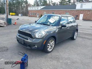 2014 MINI Countryman S with VIN WMWZC3C58EWP27041, listed as a IAAI auction lot 42082489 with 77,749 mi miles and . Bid and sale history available at DreamBid. Image 2.