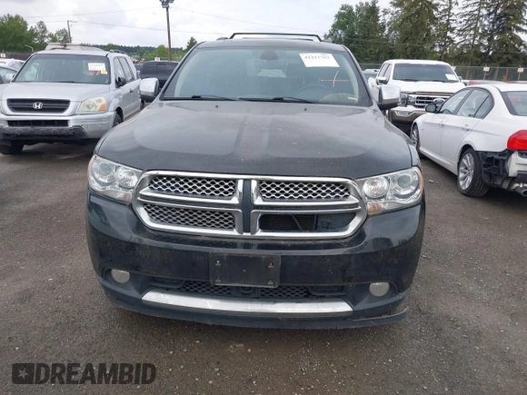 2012 Dodge Durango Citadel z VIN 1C4SDJET8CC116894, wystawiony jako IAAI lot #42211763 z przebiegiem 146 555 mil mil oraz . Historia ofert i sprzedaży dostępna na DreamBid. Obrazek 12.