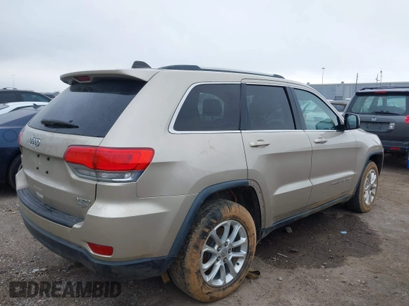 2014 Jeep Grand Cherokee Laredo with VIN 1C4RJEAG5EC424244, listed as a IAAI auction lot 41608821 with 156,251 mi miles and . Bid and sale history available at DreamBid. Image 4.