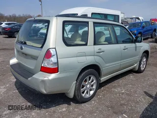 2007 Subaru Forester X w/Premium Pkg with VIN JF1SG656X7H710030, listed as a IAAI auction lot 42027771 with 201,433 mi miles. Bid and sale history available at carsss.com. Image 4.