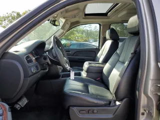 2009 GMC Yukon SLT w/4SA with VIN 1GKFC33J99R148006, listed as a Copart auction lot 88668535 with 145,088 mi miles and Salvage Title. Bid and sale history available at carsss.com. Image 7.