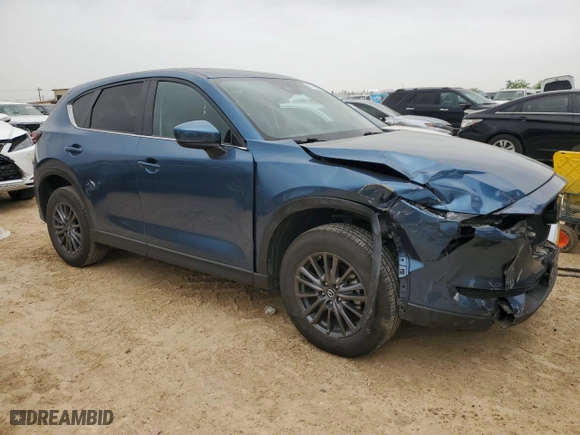 2019 Mazda CX-5 Touring with VIN JM3KFACM9K0662181, listed as a Copart auction lot 51259545 with 52,246 mi miles and Salvage Title. Bid and sale history available at carsss.com. Image 4.