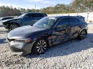 2024 Honda Civic EX-L z VIN 19XFL1H79RE027520, wystawiony jako Copart lot #46488045 z przebiegiem 7 046 mil mil oraz Szkoda całkowita • Salvage title. Historia ofert i sprzedaży dostępna na DreamBid. Obrazek 1.