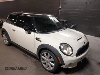 2010 MINI Hardtop S with VIN WMWMF7C5XATX41382, listed as a IAAI auction lot 40558359 with 96,158 mi miles and . Bid and sale history available at DreamBid. Image 1.