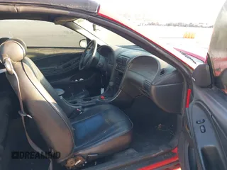 2004 Ford Mustang Deluxe with VIN 1FAFP44644F221637, listed as a IAAI auction lot 41625384 with 123,424 mi miles. Bid and sale history available at carsss.com. Image 5.