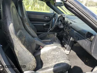 2000 Toyota MR2 z VIN JTDFR3201Y0005329, wystawiony jako Copart lot #75106494 z przebiegiem Nie podano mil oraz Szkoda całkowita • Salvage title. Historia ofert i sprzedaży dostępna na DreamBid. Obrazek 10.