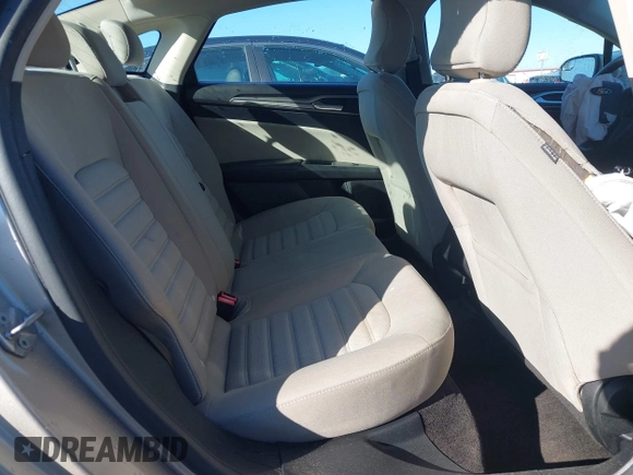 2018 Ford Fusion S z VIN 3FA6P0UU8JR271589, wystawiony jako IAAI lot #41318471 z przebiegiem 148 793 mil mil oraz . Historia ofert i sprzedaży dostępna na DreamBid. Obrazek 8.