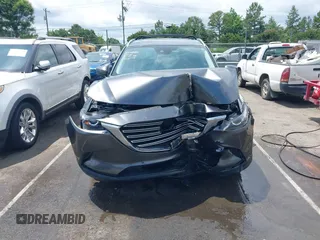 2019 Mazda CX-9 Touring with VIN JM3TCACY6K0334085, listed as a IAAI auction lot 42391595 with 113,723 mi miles and . Bid and sale history available at DreamBid. Image 12.