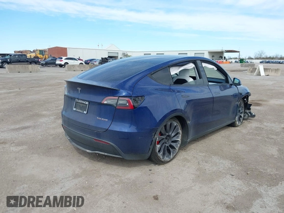 2021 Tesla Model Y Performance z VIN 5YJYGDEF8MF245641, wystawiony jako IAAI lot #41685230 z przebiegiem 25 903 mil mil oraz . Historia ofert i sprzedaży dostępna na DreamBid. Obrazek 4.