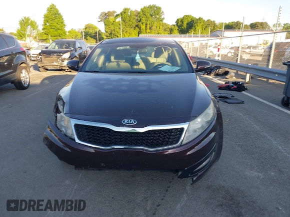 2013 Kia Optima LX with VIN 5XXGM4A71DG124725, listed as a IAAI auction lot 42041768 with 184,181 mi miles and . Bid and sale history available at carsss.com. Image 12.