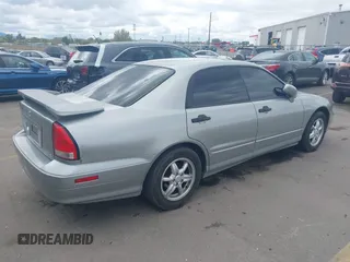 2002 Mitsubishi Diamante z VIN 6MMAP87P72T013353, wystawiony jako IAAI lot #42070862 z przebiegiem 169 400 mil mil oraz . Historia ofert i sprzedaży dostępna na DreamBid. Obrazek 4.