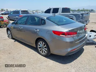 2018 Kia Optima LX with VIN 5XXGT4L34JG266575, listed as a IAAI auction lot 42458844 with 73,394 mi miles and . Bid and sale history available at DreamBid. Image 3.