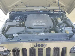 2013 Jeep Wrangler Sport with VIN 1C4AJWAG3DL649487, listed as a Copart auction lot 52568285 with 106,644 mi miles and Salvage title. Bid and sale history available at DreamBid. Image 12.