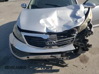 2011 Kia Sportage LX z VIN KNDPBCA2XB7102202, wystawiony jako Copart lot #55606785 z przebiegiem 84 311 mil mil oraz Szkoda całkowita • Salvage title. Historia ofert i sprzedaży dostępna na DreamBid. Obrazek 12.