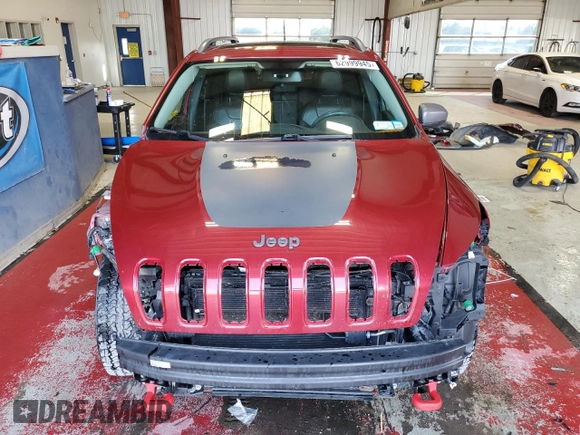 2016 Jeep Cherokee Trailhawk with VIN 1C4PJMBS2GW298186, listed as a Copart auction lot 62999945 with 153,064 mi miles and Salvage title. Bid and sale history available at DreamBid. Image 5.