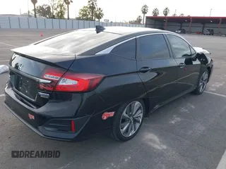 2018 Honda Clarity Plug-In Hybrid Touring with VIN JHMZC5F39JC000901, listed as a IAAI auction lot 41914470 with 80,482 mi miles. Bid and sale history available at carsss.com. Image 4.