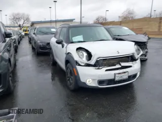 2016 MINI Countryman S with VIN WMWZC3C58GWT08920, listed as a IAAI auction lot 41576418 with 150,777 mi miles and . Bid and sale history available at DreamBid. Image 1.