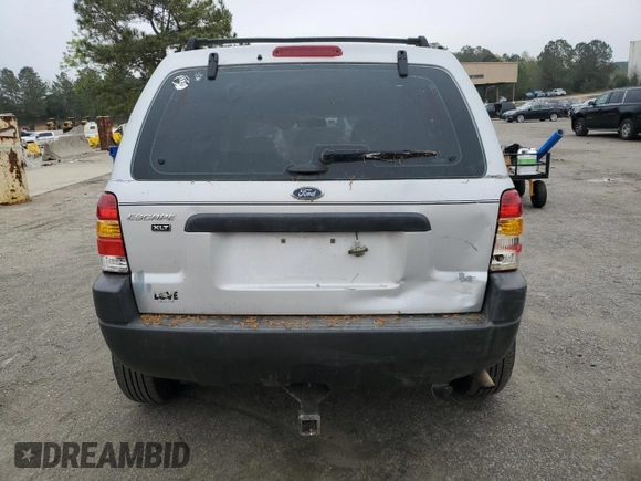 2003 Ford Escape XLS Popular with VIN 1FMYU02173KB43156, listed as a Copart auction lot 51534495 with 266,600 mi miles and Salvage title. Bid and sale history available at DreamBid. Image 6.