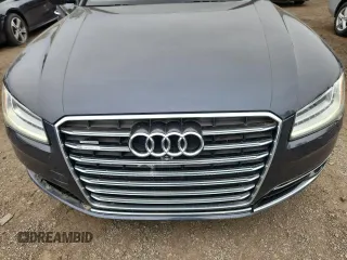 2015 Audi A8 4.0T with VIN WAUJ2AFD6FN011009, listed as a Copart auction lot 64173005 with 153,377 mi miles and Salvage title. Bid and sale history available at DreamBid. Image 11.