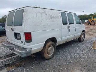 2002 Ford Econoline Cargo with VIN 1FTNE24L42HB67991, listed as a IAAI auction lot 40816497 with 310,862 mi miles. Bid and sale history available at carsss.com. Image 4.