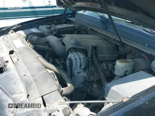 2007 Chevrolet Suburban LS with VIN 1GNFC16J87R324141, listed as a IAAI auction lot 42370041 with 185,352 mi miles and . Bid and sale history available at DreamBid. Image 15.