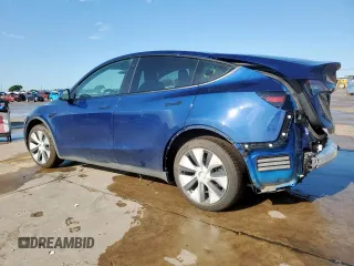 2022 Tesla Model Y Long Range z VIN 7SAYGDEEXNF372693, wystawiony jako Copart lot #53275555 z przebiegiem 51 165 mil mil oraz Szkody całkowita. Historia ofert i sprzedaży dostępna na DreamBid. Obrazek 2.