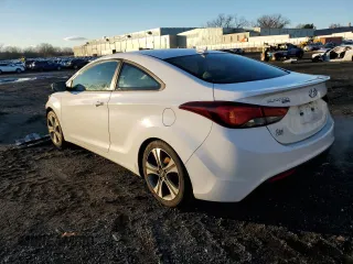2014 Hyundai Elantra Coupe with VIN KMHDH6AH3EU025665, listed as a Copart auction lot 84617794 with 112,994 mi miles and Salvage Title. Bid and sale history available at carsss.com. Image 2.