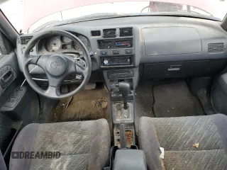 2000 Toyota RAV4 z VIN JT3HP10V2Y7162705, wystawiony jako Copart lot #54268515 z przebiegiem 310 778 mil mil oraz Czysty tytuł • Clean title. Historia ofert i sprzedaży dostępna na DreamBid. Obrazek 8.
